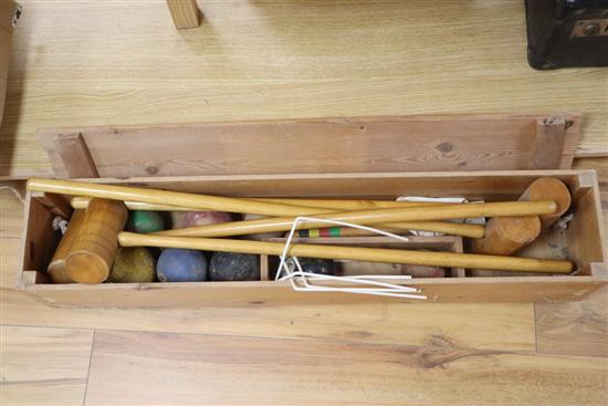 A pine cased croquet set